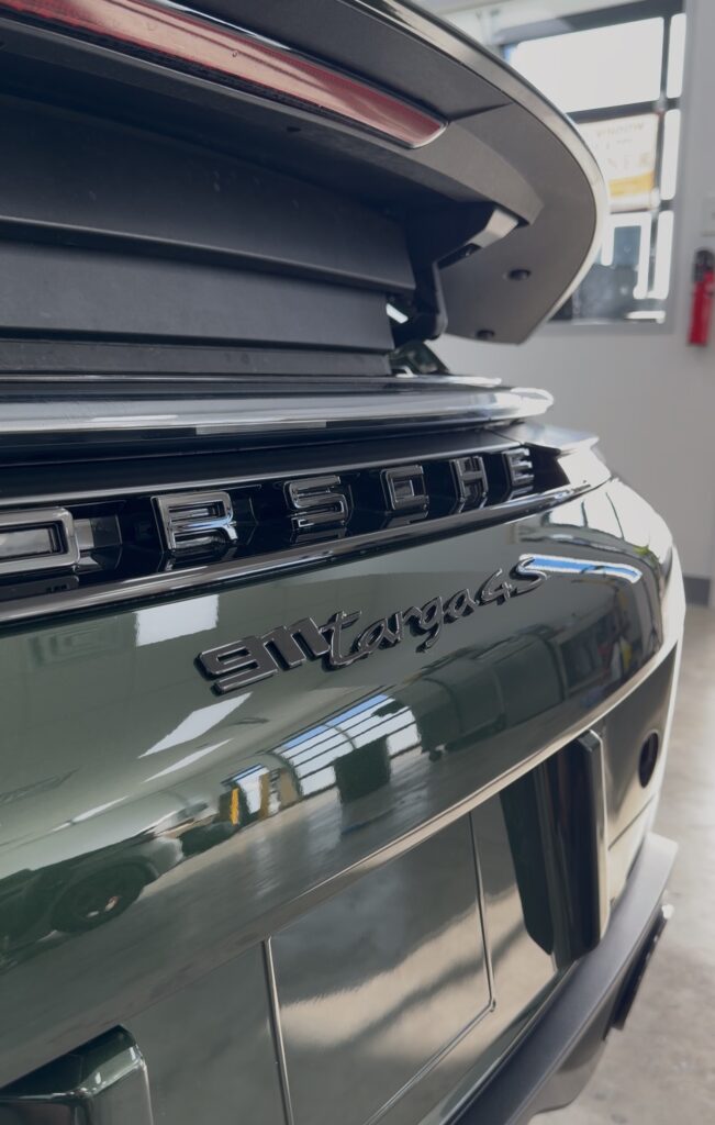 Porsche 911 Targa 4S rear badge and light bar after paint protection film at APS in Austin, TX