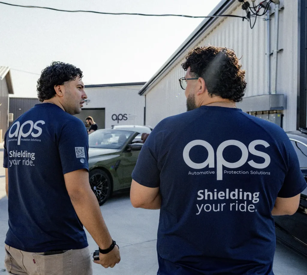 The APS team in Shielding Your Ride shirts at the shop in Austin, TX