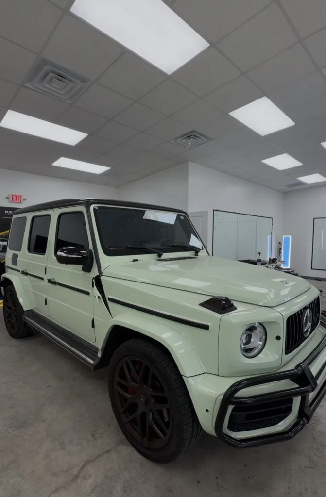 2020 Mercedes-AMG G63 in green vinyl wrap before removal at APS in Austin, TX