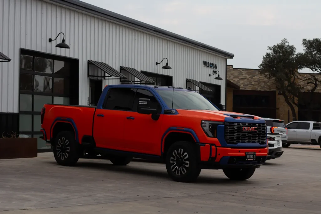 GMC Sierra HD with orange and blue color PPF at APS in Austin, TX
